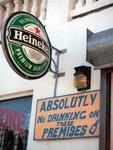 A beer sign next to a "no drinking" sign.  What next?