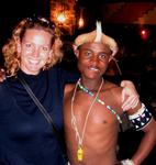 Cherie with a Zulu dancer (whistle not customary Zulu attire.)