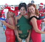 Lisa, Cherie and Karem dressed in holiday cheer.