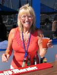 The American Legion office manager Linda Christensen doubles as the 4th of July bartender.  