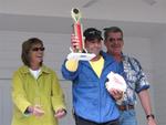 Lloyd Majer won top honors in the men's division.  Lloyd played multiple songs with his conch.