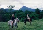 Kristi and Cherie on horseback.  The volcano graciously decided to erupt at the very moment we were having our photo snapped!  How sweet!