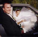 Matt and Deb (Elise) stuffed into her car on her wedding day.  Most women change only their last name when they get married.  But Deb changed both her names.  Deb Baldwin turned into Elise Crocker!