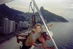 Cherie hang-gliding in Rio, Brazil.  I didn't have to sign one form before this guy told me to hold on as he ran off a plank protruding from a mountain.  Luckily we landed safely on the soft sandy beach below.