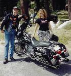 My Dad (Stan) and I with John's flamin' Harley.