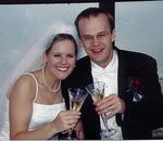 Jennifer and Mike Brown on their wedding day. I just recently saw them even happier, holding their new son "Connor" in their arms.