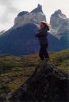 Cherie in front of Torres Del Paines, Chile.  (Notice the little hill I climbed for the picture...what a mountain climber I am!)