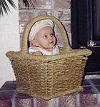 Is it bigger than a bread basket?  Ellie.
