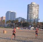 His "reward" for finishing the swim so fast, is a long barefoot run up the beach.