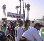The crowd gathers at the finish line.