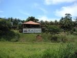 From a distance, it looks like some teenager spray-painted the "Resort" sign to the hotel.