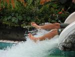 Greg sliding down the water-slide at Tabacon Resort.  I made him slide down that slide a ton of times before I could even "catch" his feet on film.