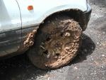 Fortunately, we waved down another truck to pull us out of the mud.  Now that is off-roading!