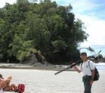 Our tour guide Roberto and a sunbather in a G-string. 