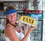 All you need to be a taxi cab driver in Costa Rica is a sign that you can buy at any local hardware store.