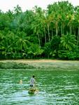 Our new friend paddling back to his villiage.