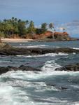 The blue waters, cream sands, red earth and green trees of Punta Cocos.