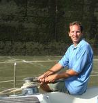 Greg with the walls of the first lock behind him.