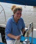 Anne, a natural at the helm.  (Probably because she is used to steering Cassiopeia which is 24 feet longer than Scirocco.)