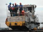 The Canal workers on a locomotive (used to guide the lines of ships just slightly larger than Scirocco.)