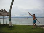 Rennie practicing spear-throwing on Porvenir (the most developed island?)  Scirocco is anchored in the background.