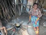 You really feel like you've been transported back in time.  I turned a corner and found this Kuna woman boiling peppers.