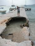 While we visited the United States, 25 knot winds visted the San Blas Islands.  The strong winds ravaged the huts and destroyed this concrete pier that had been standing for over 25 years.