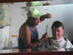 Tom decides to get his hair cut, too!