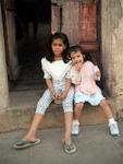 Sisters in a doorway.