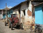 Two of the most common forms of transportation--tractors and bicylces.