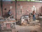 Workers making guitars.