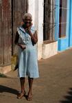 A lady in a blue dress.