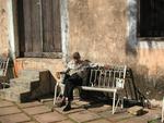 Man on a bench.