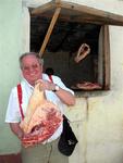 Helmut, our Austrian friend, buys a pork leg for $15 at the local butcher.