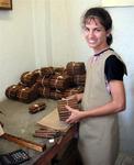 Her job is to make the deadly sticks of tobacco look pretty.