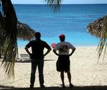 The sea mesmerized Tom and Mike.