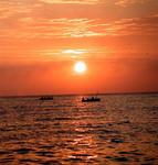 Fishermen at sunrise.