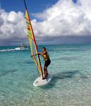 Winsurfing in Grace Bay in Provo (Turks and Caicos.)  I mastered the art of going out to sea, I just never figured out how to turn around and get back to shore!  (Good thing they had a lifeguard to rescue me!!)