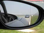 Greg's Nissan 300ZX in Tom's rear-view mirror.