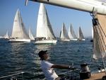 Luis trims the jib of "Mistress" in the 6th 2003 San Diego Beer Cup Race.