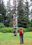 Greg admiring one of Sitka's totem poles.