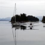 A float plane lands right next to S/V Bob.  *Photo by Dave.