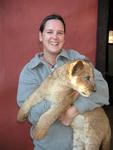 Julie with a lion cub.