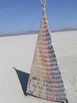 A teepee made out of soy-sauce packets.