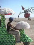 Mushroom scooter stops to admire fallen chandelier.