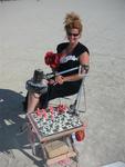 Cherie plays chess in the desert.