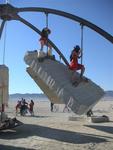 18,000 pound granite slabs floating in the air.