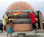 Singing makes us hungry, so we stop to share a burger.