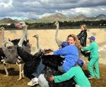 Cherie and Carter become ostrich jockeys for the day.