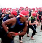 The ocean becomes a sea of red (bathing caps.)